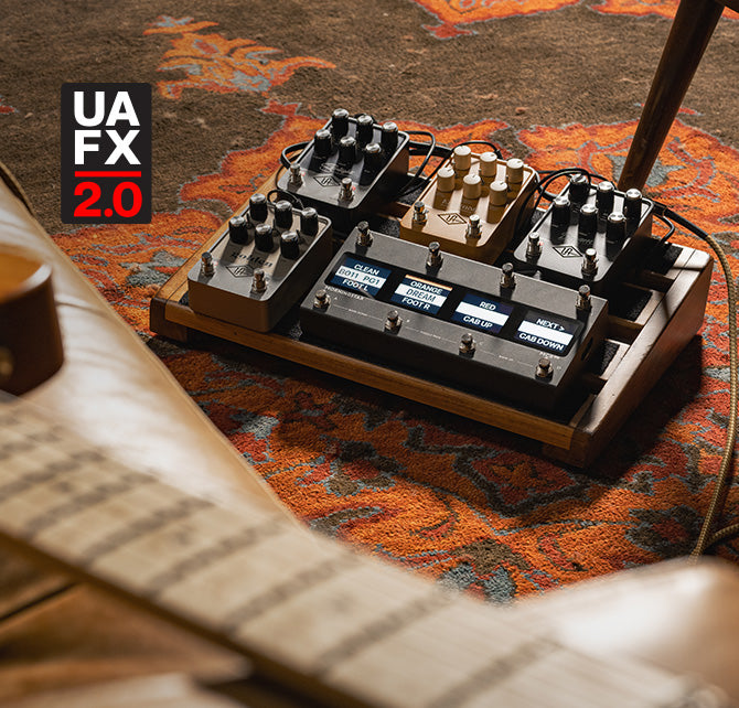 Telecaster and pedal board with UAFX pedals and midi controller