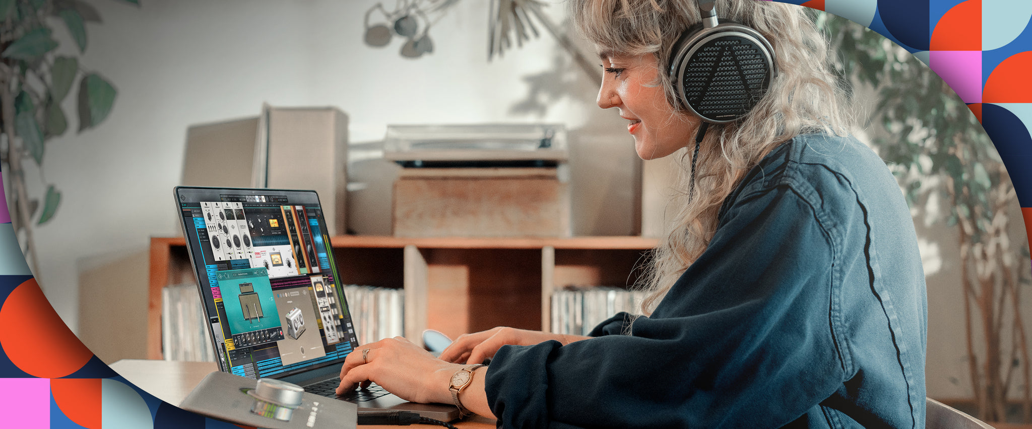 Woman with headphones on sitting at laptop with UAD explore FREE plug-ins pulled up